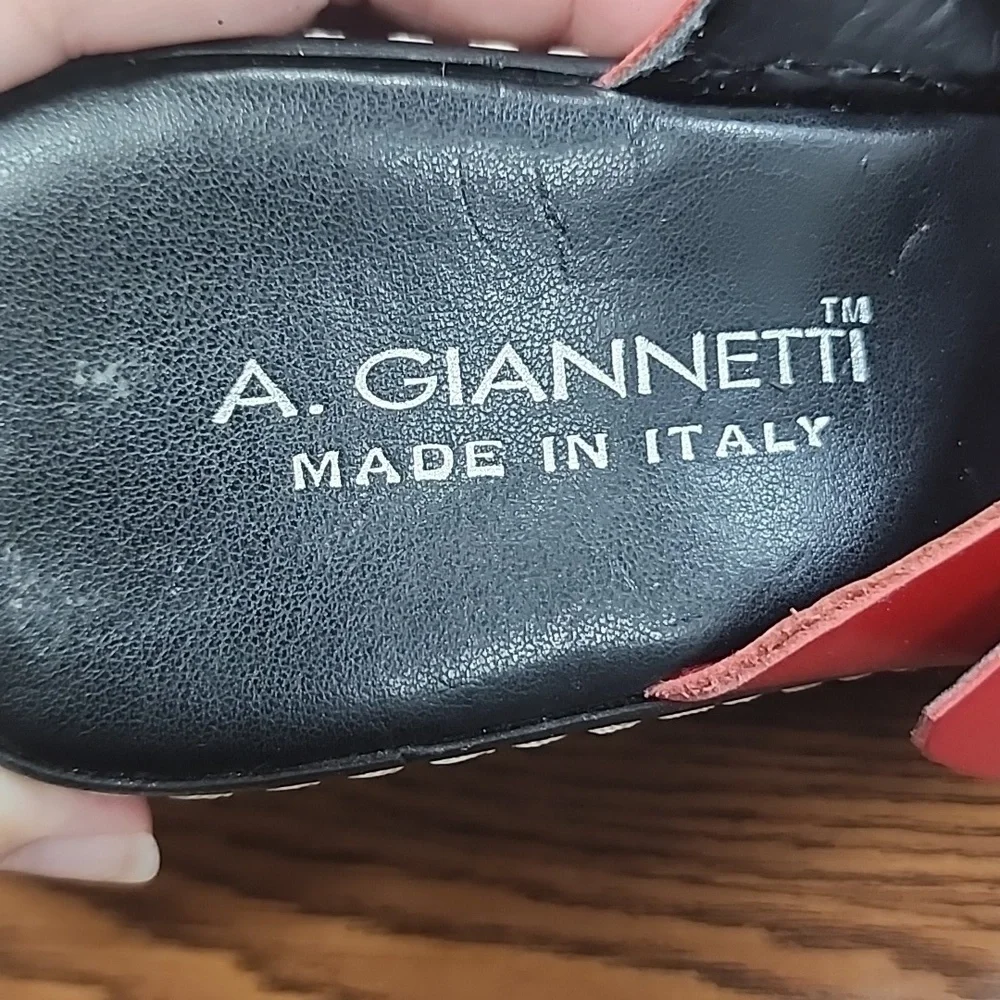 A. Gianetti red leather buckle wedge heels